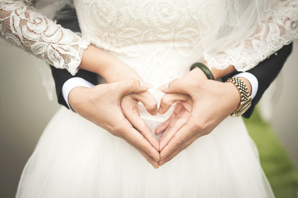a generic picture of a couple's hands in the shape of a heart to celebrating Saint Dwynwen's Day.