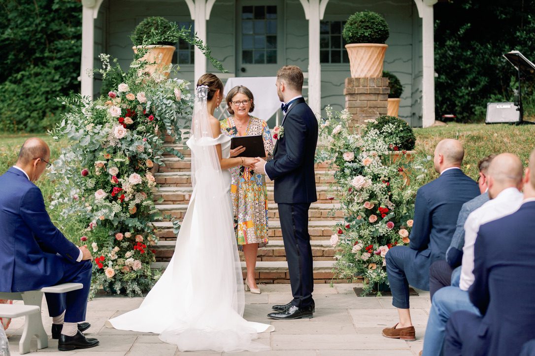Non religious wedding ceremonies can take place outside like this, where the couple exchange vows in a garden with a celebrant