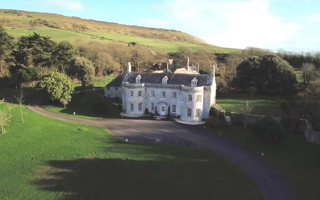 an image of smedmore house stone house sitting in its own grounds a beautiful wedding venue in dorset