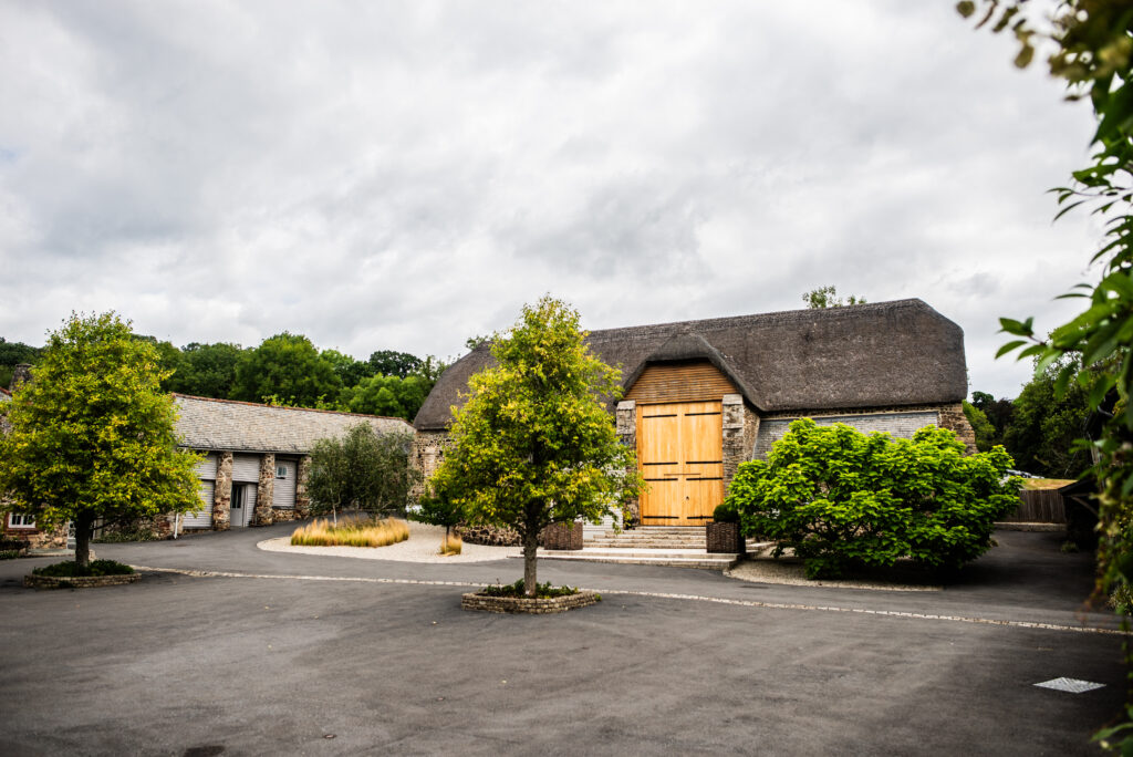 photograph showing The Great Barn courtyard with its huge oak door dominating the space