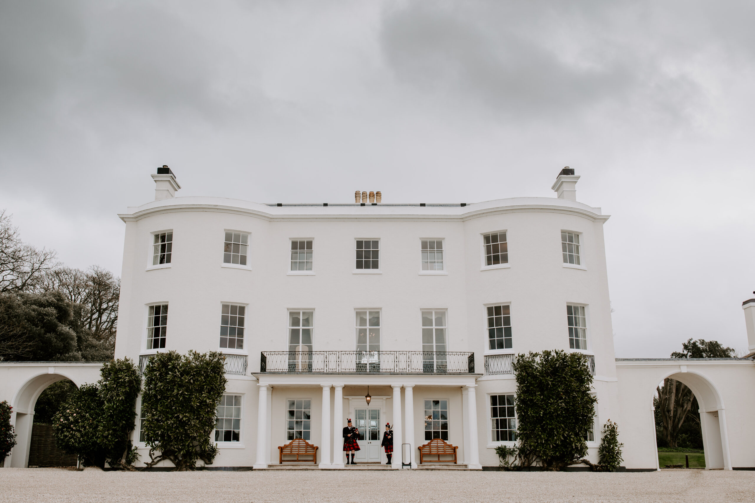 Rockbeare Manor a White grand manor house in the style you'd see at a Bridgerton Wedding