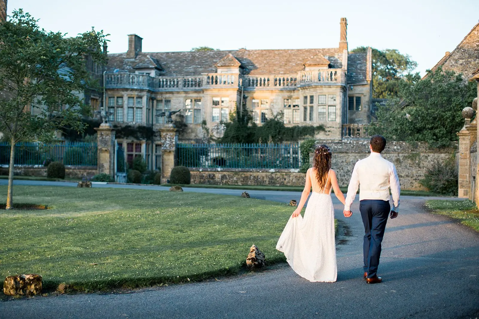 A bride and groom walking back to a manor house, some of the lovely people and places I have worked with