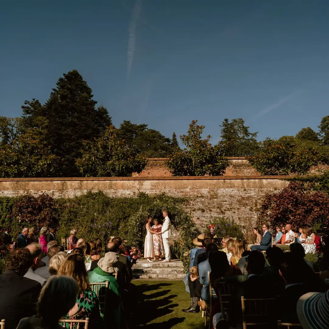 An English Country Garden Wedding A good ceremony for a bride and groom with their guests in a walled garden with wedding celebrant Fan